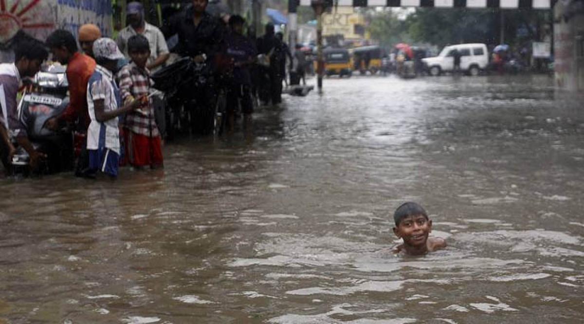 Chennai Marooned in flood waters photos